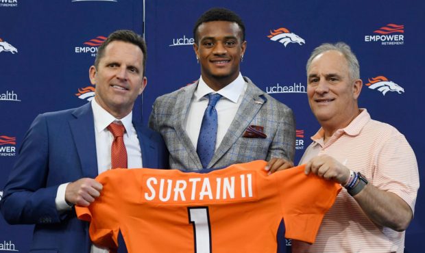ENGLEWOOD, CO - APRIL 30: Denver Broncos first round draft pick, Patrick Surtain II, center, poses ...