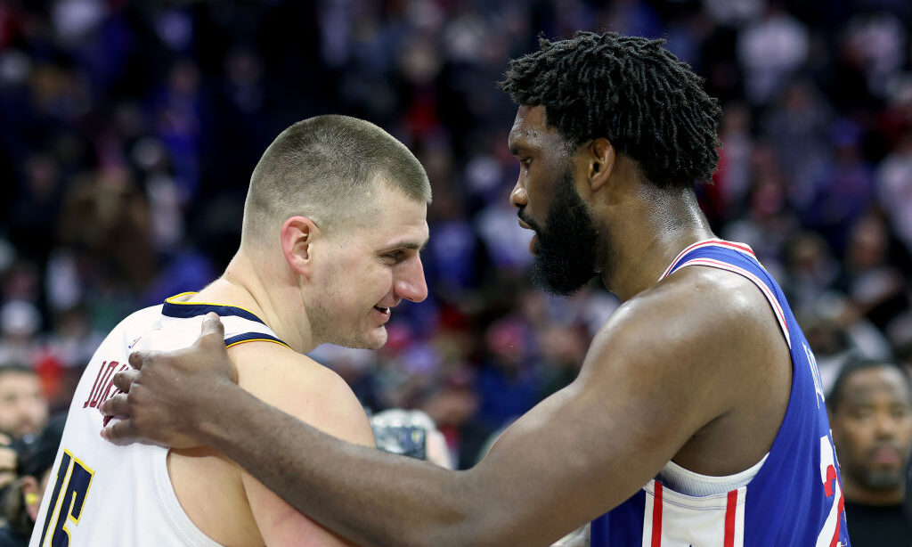 Joel Embiid #21 of the Philadelphia 76ers and Nikola Jokic #15 of the Denver Nuggets speak followin...