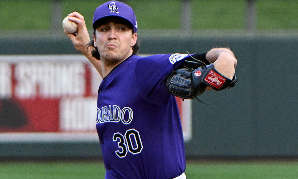 Rockies pitcher Chase Dollander...