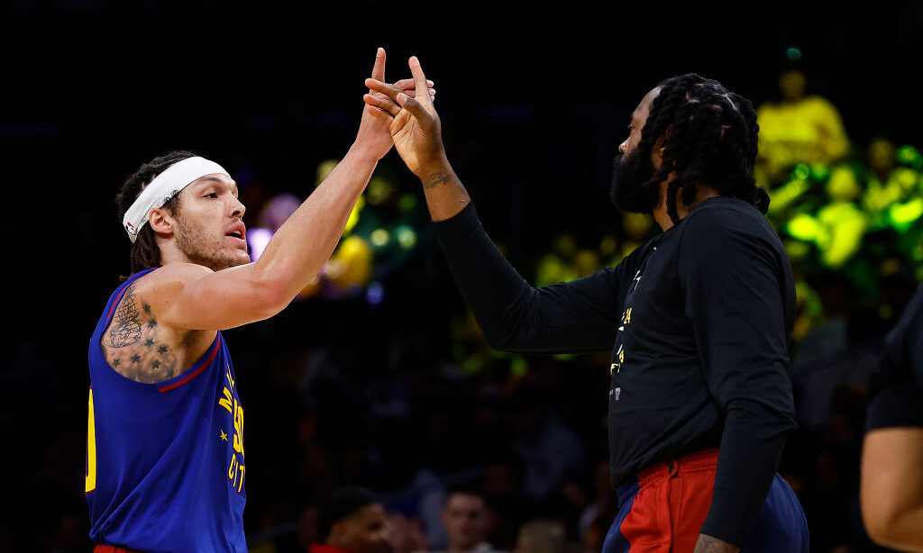 Aaron Gordon #50 and DeAndre Jordan #6 of the Denver Nuggets in the third quarter during game three...