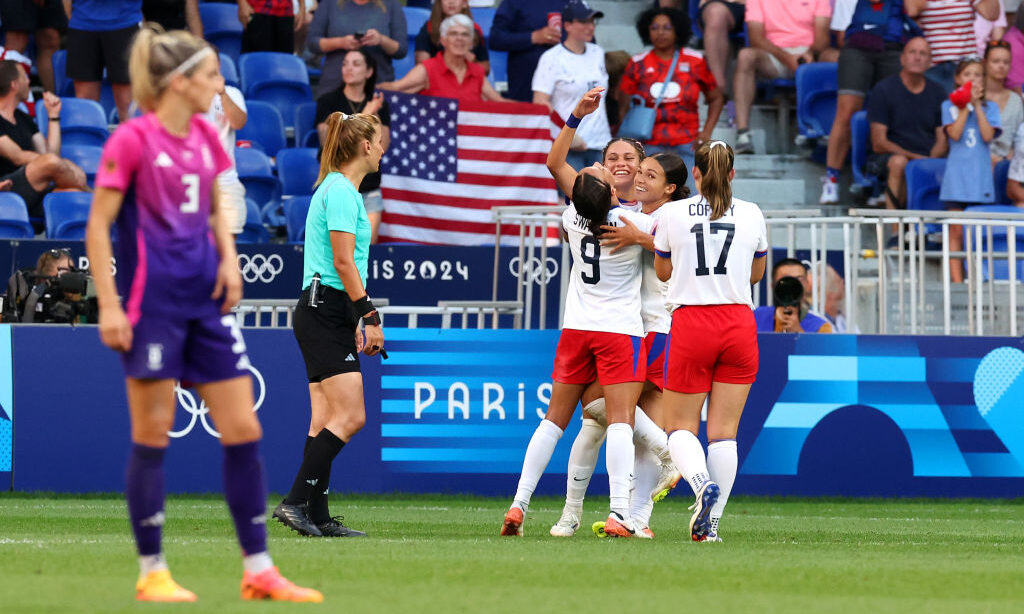 Players of Team United States celebrate after Sophia Smith #11 of Team United States scores her tea...