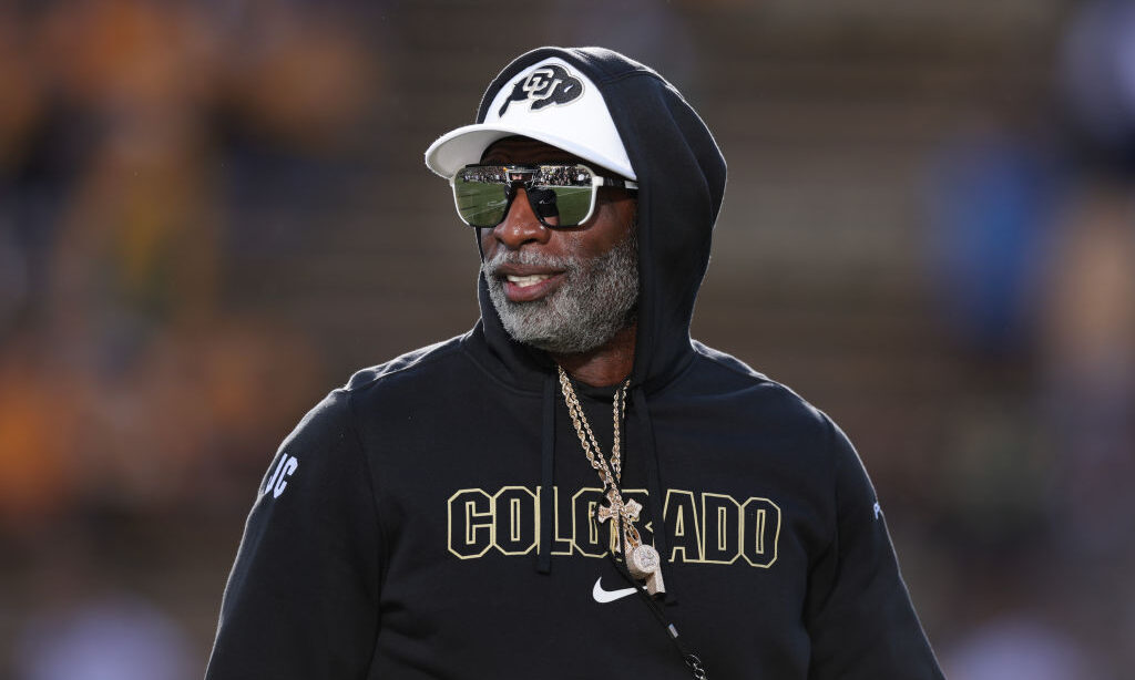 BOULDER, COLORADO - AUGUST 29: Head coach Deion Sanders of the Colorado Buffaloes looks on prior to...