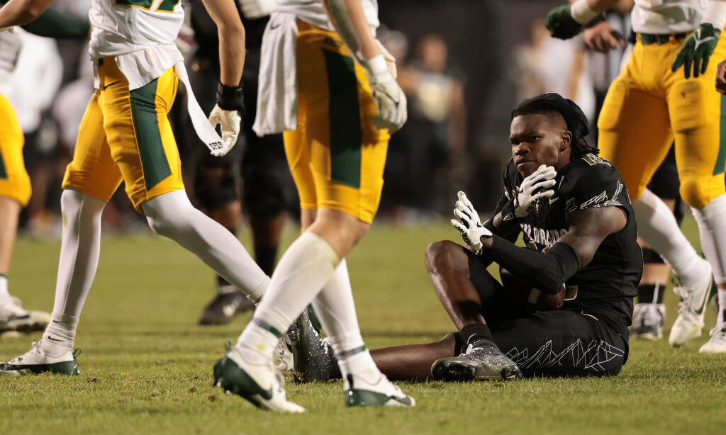 BOULDER, COLORADO - AUGUST 29: Travis Hunter #12 of the Colorado Buffaloes reacts after catching a ...