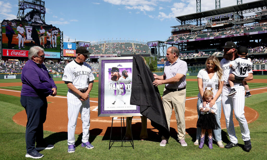 Colorado Rockies Owner Dick Monfort unveils an artwork for Charlie Blackmon at a ceremony honoring ...