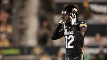 BOULDER, COLORADO - OCTOBER 12: Travis Hunter #12 of the Colorado Buffaloes looks on during the fir...