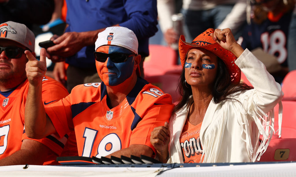 DENVER, COLORADO - OCTOBER 27: Denver Broncos fans cheer during the second quarter against the Caro...