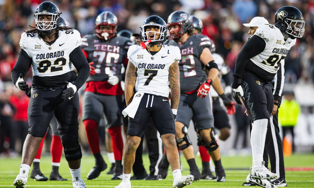 LUBBOCK, TEXAS - NOVEMBER 09: Anquin Barnes Jr. #92, Cam'Ron Silmon-Craig #7, and Tawfiq Thomas #95...