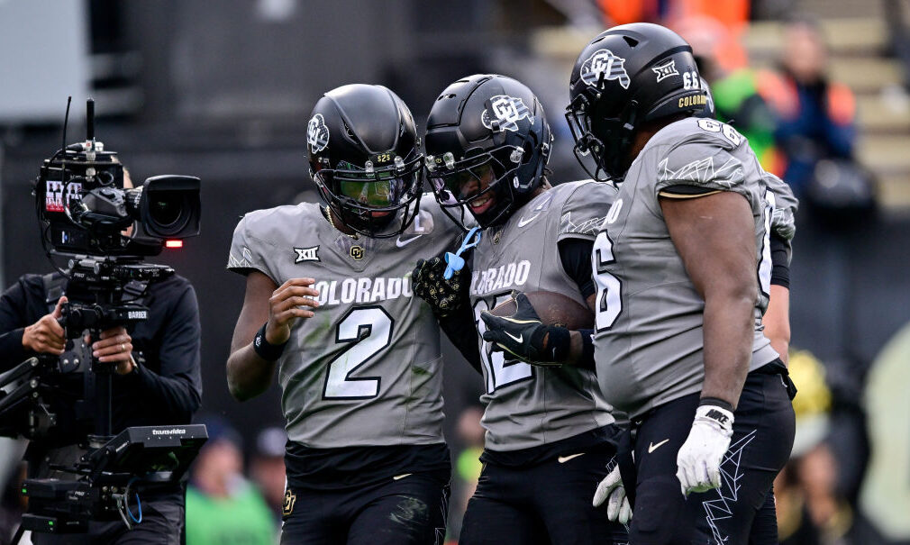 Shedeur Sanders #2 and Travis Hunter #12 of the Colorado Buffaloes...