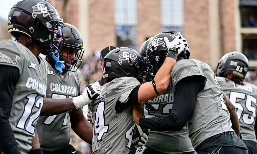 BOULDER, CO - NOVEMBER 16: Charlie Offerdahl #44 of the Colorado Buffaloes celebrates with Cash Cle...