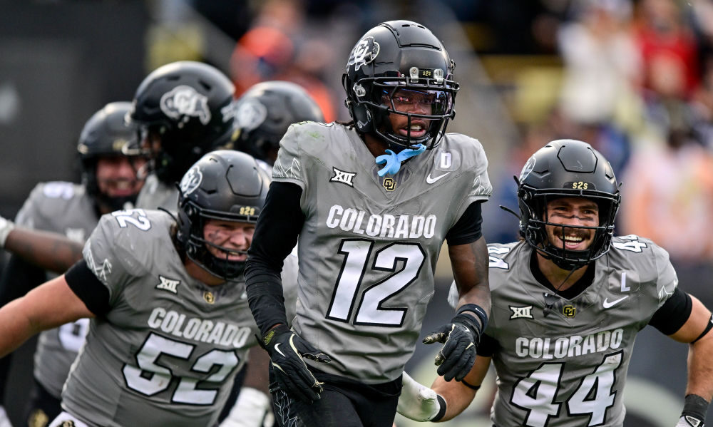 Travis Hunter #12 of the Colorado Buffaloes celebrates after scoring a fourth quarter touchdown at ...