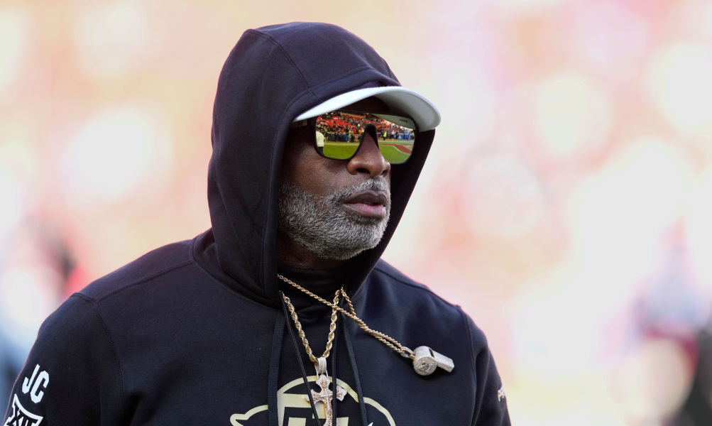 KANSAS CITY, MISSOURI - NOVEMBER 23: Head coach Deion Sanders of the Colorado Buffaloes watches his...