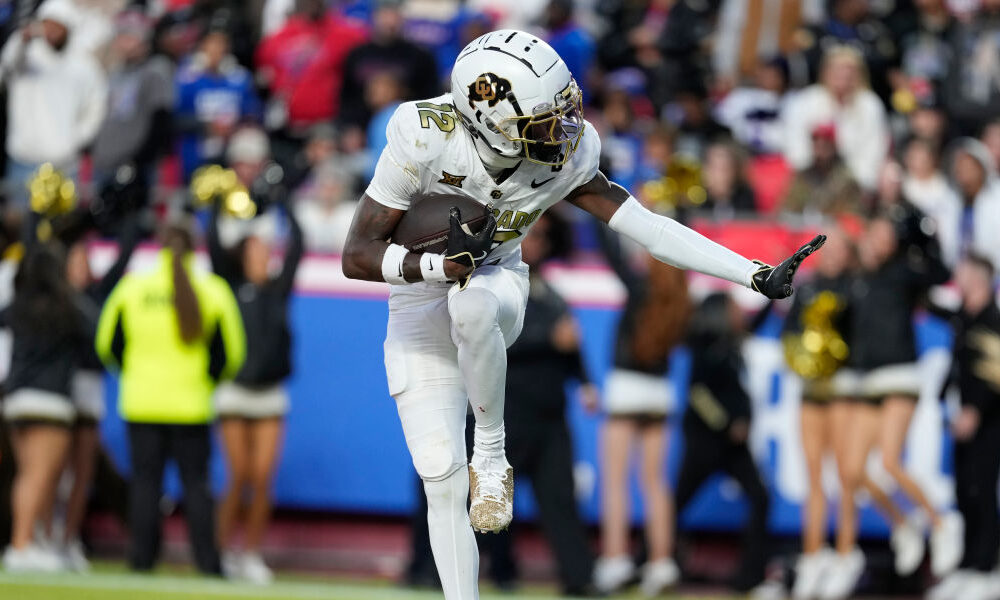 KANSAS CITY, MISSOURI - NOVEMBER 23: Wide receiver Travis Hunter #12 of the Colorado Buffaloes cele...