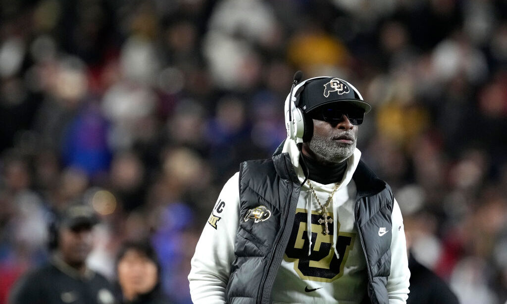KANSAS CITY, MISSOURI - NOVEMBER 23: Head coach Deion Sanders of the Colorado Buffaloes looks up at...