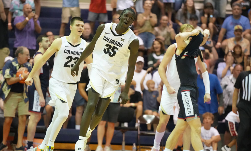 LAHAINA, HI - NOVEMBER 26: Assane Diop #35 of the Colorado Buffaloes celebrates winning after the M...