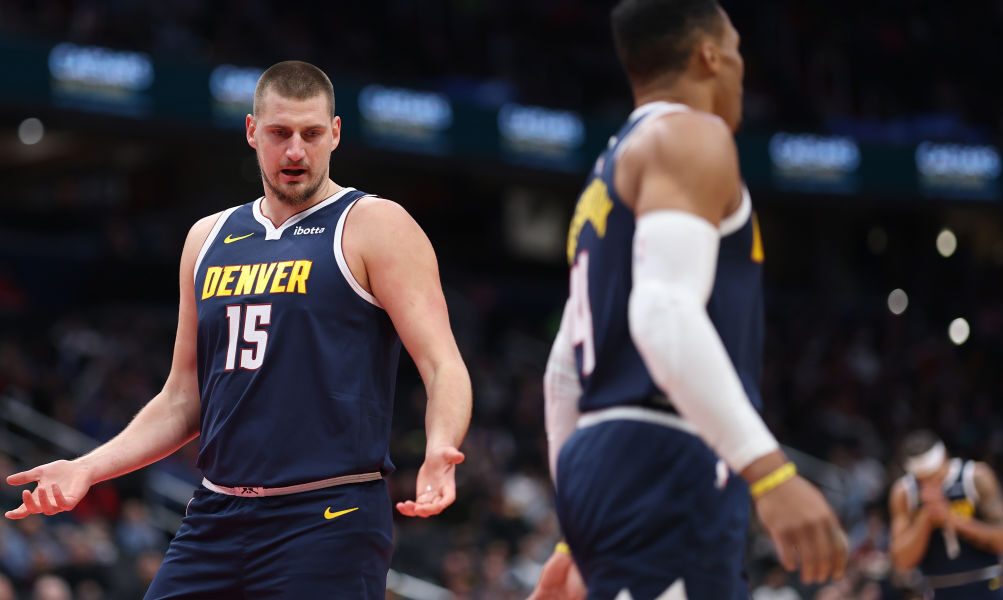 Nikola Jokic #15 of the Denver Nuggets reacts against the Washington Wizards...