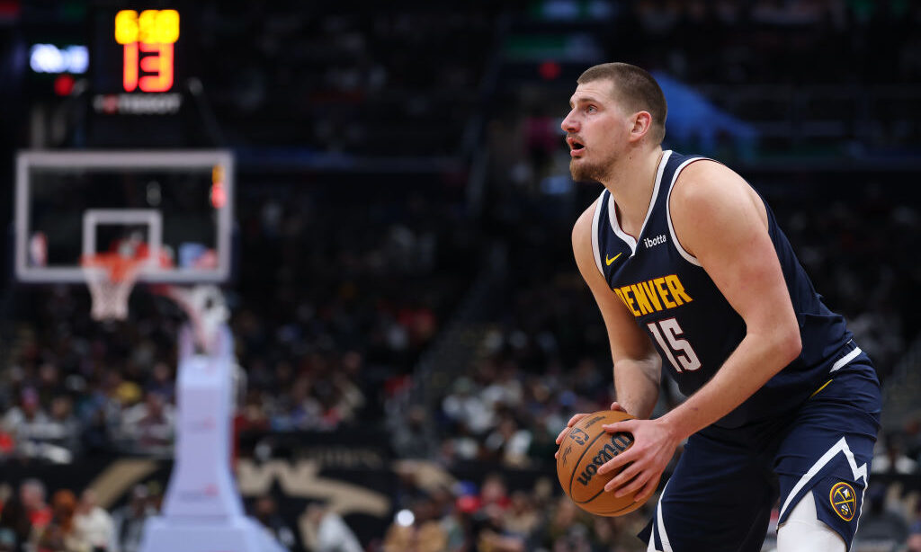 Nikola Jokic #15 of the Denver Nuggets shoots against the Washington Wizards during the second half...
