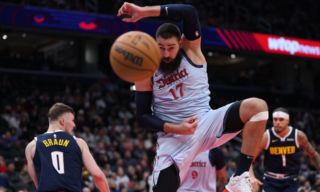 Jonas Valanciunas #17 of the Washington Wizards rebounds against the Denver Nuggets during the seco...
