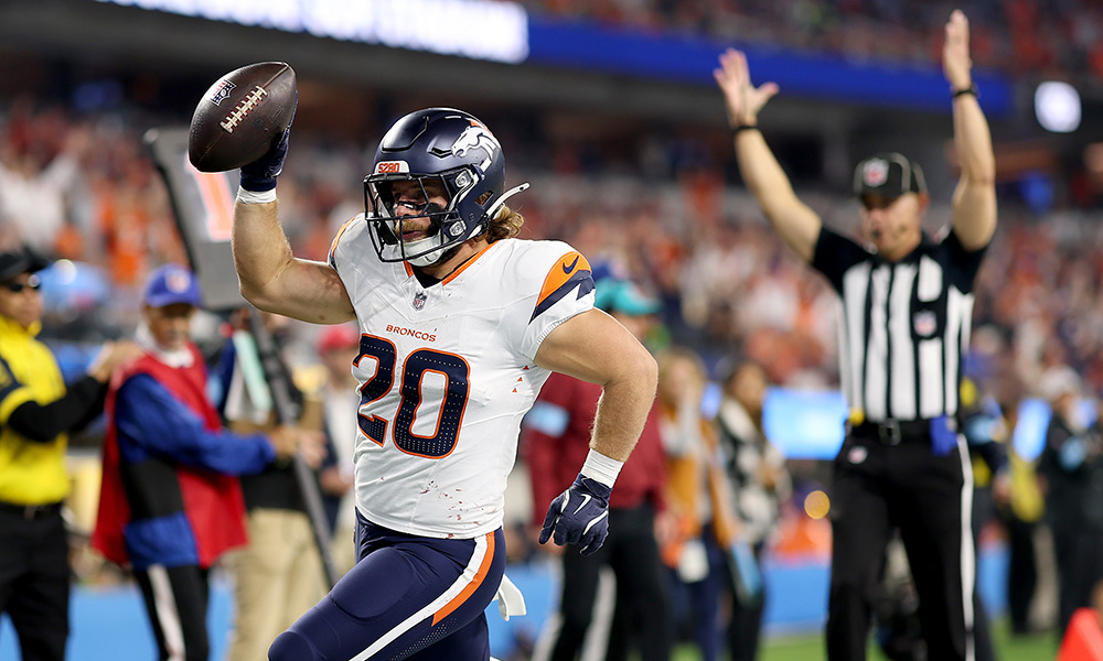 Broncos fullback Michael Burton...