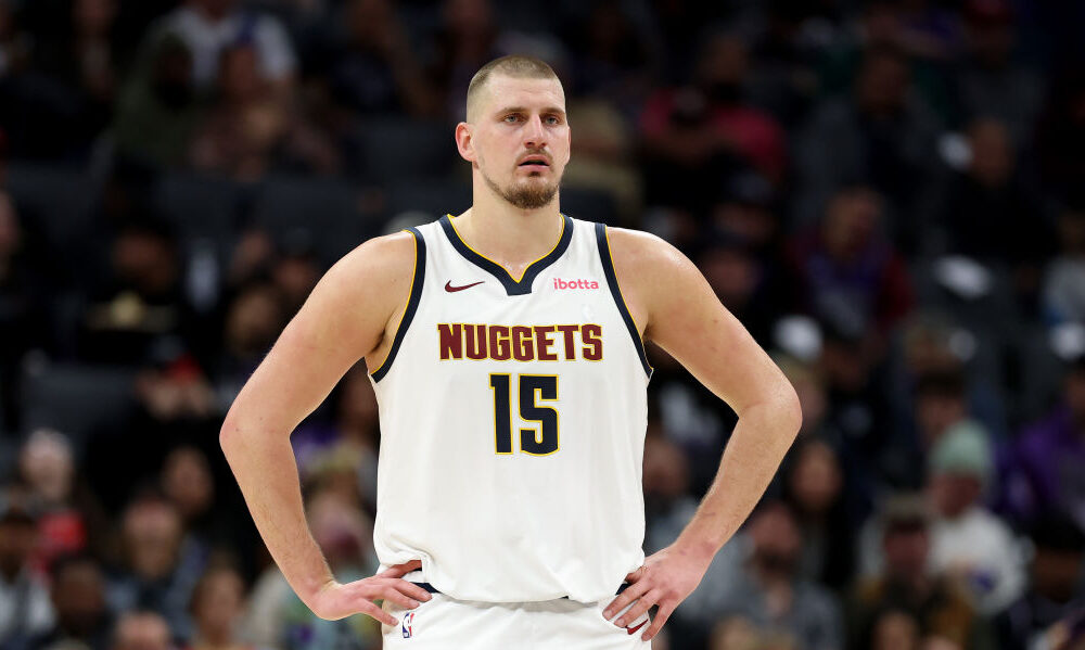 Nikola Jokic #15 of the Denver Nuggets stands on the court during their game against the Sacramento...