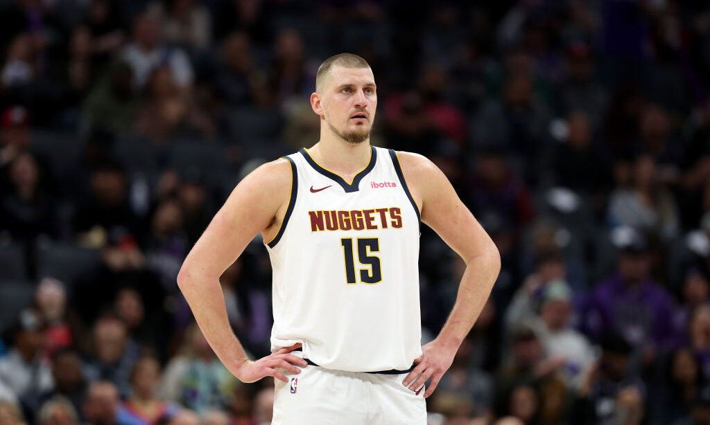 Nikola Jokic #15 of the Denver Nuggets stands on the court during their game against the Sacramento...
