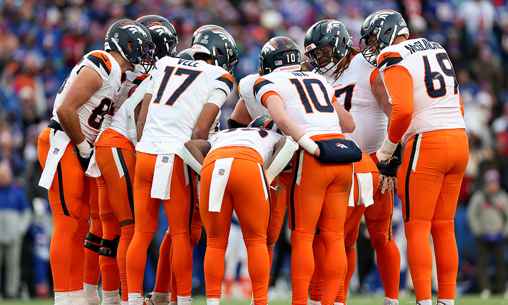 Broncos huddle NFL salary cap...