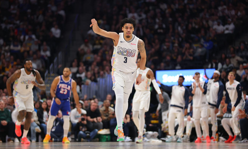 Julian Strawther #3 of the Denver Nuggets celebrates a three-point basket against the Philadelphia ...