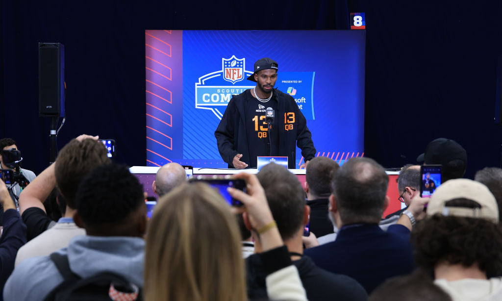 Shedeur Sanders #QB13 of Colorado speaks to the media during the NFL Combine at Lucas Oil Stadium o...