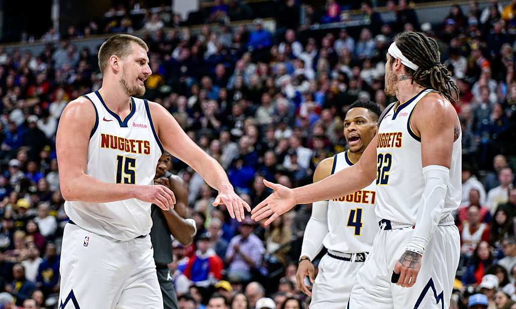 DENVER, COLORADO - APRIL 1: Nikola Jokic #15, Aaron Gordon #32, and Russell Westbrook #4 of the Den...