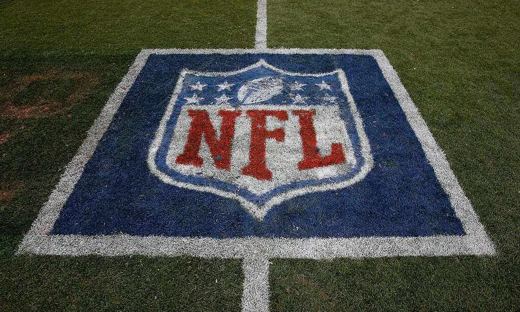 DENVER, CO - SEPTEMBER 14: The NFL logo is displayed on the turf as the Denver Broncos defeated the...