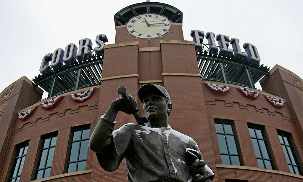 The statue of 'The Player' is dusted with snow outside the stadium as Game 3 of the National League...
