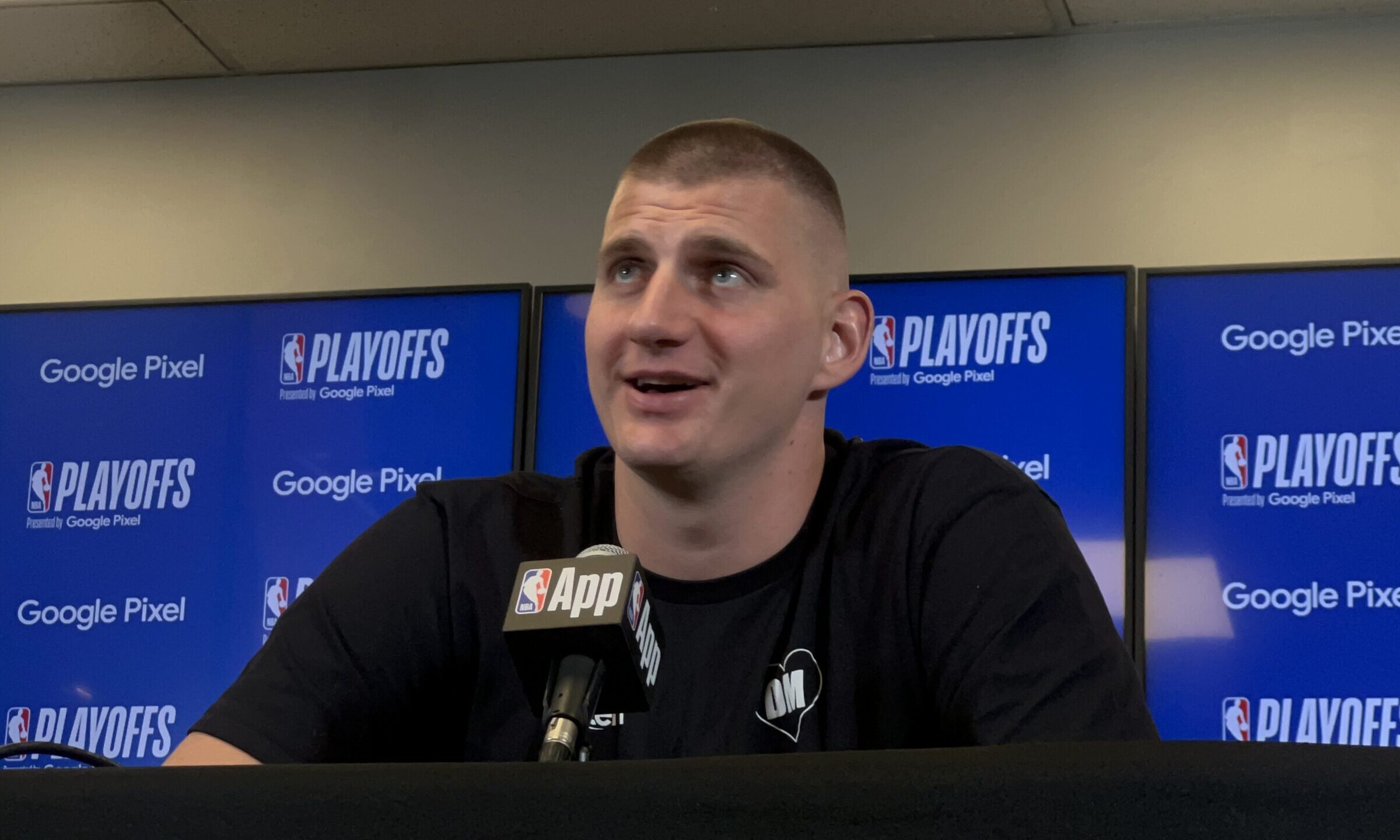 Nikola Jokic accepts his MVP trophy...
